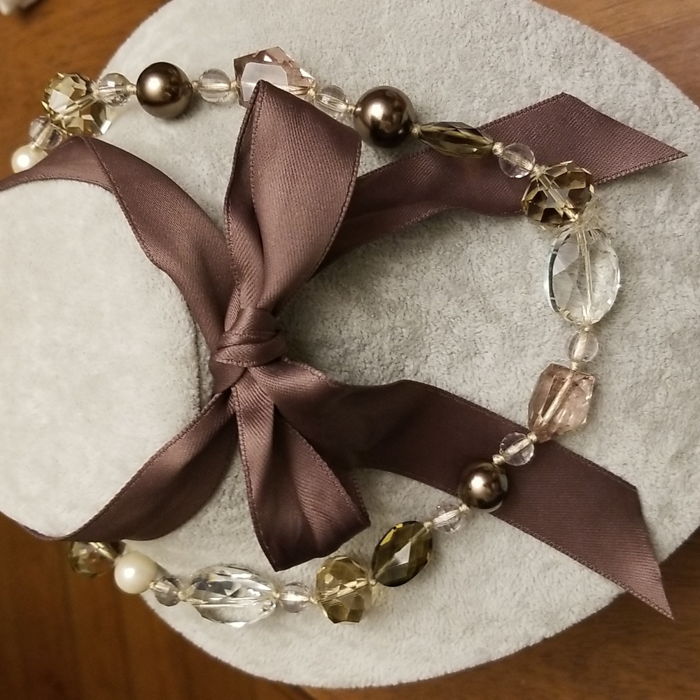 Creative earth tone beaded necklace with bowtie